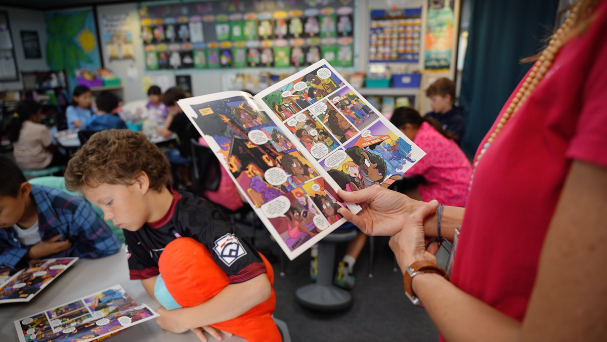 Classroom reading Hunger Action Heroes book