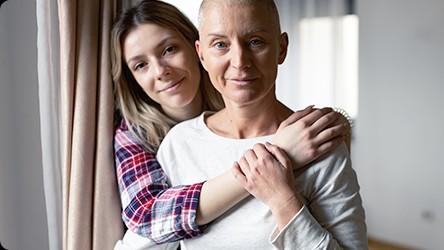 A woman embracing her mother