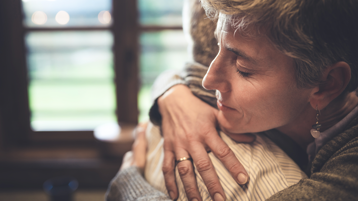 Two people hugging