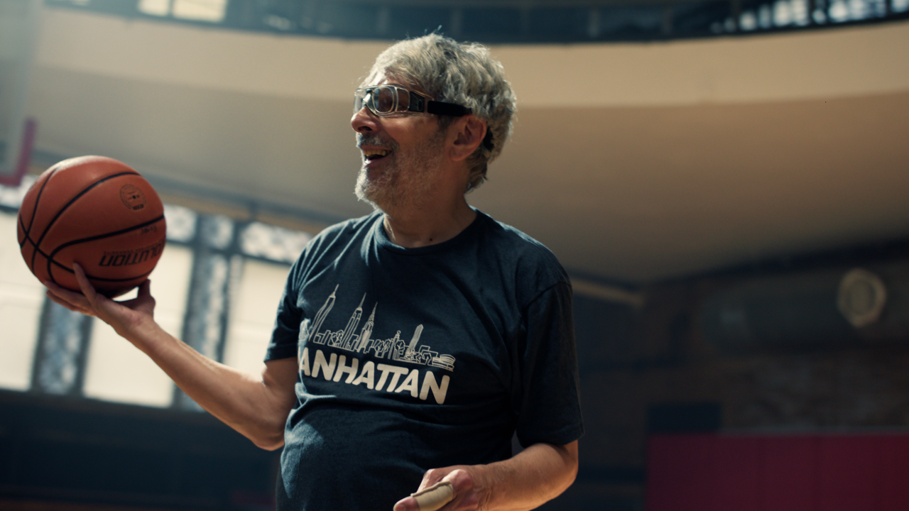 Active older adult playing basketball at the Y.
