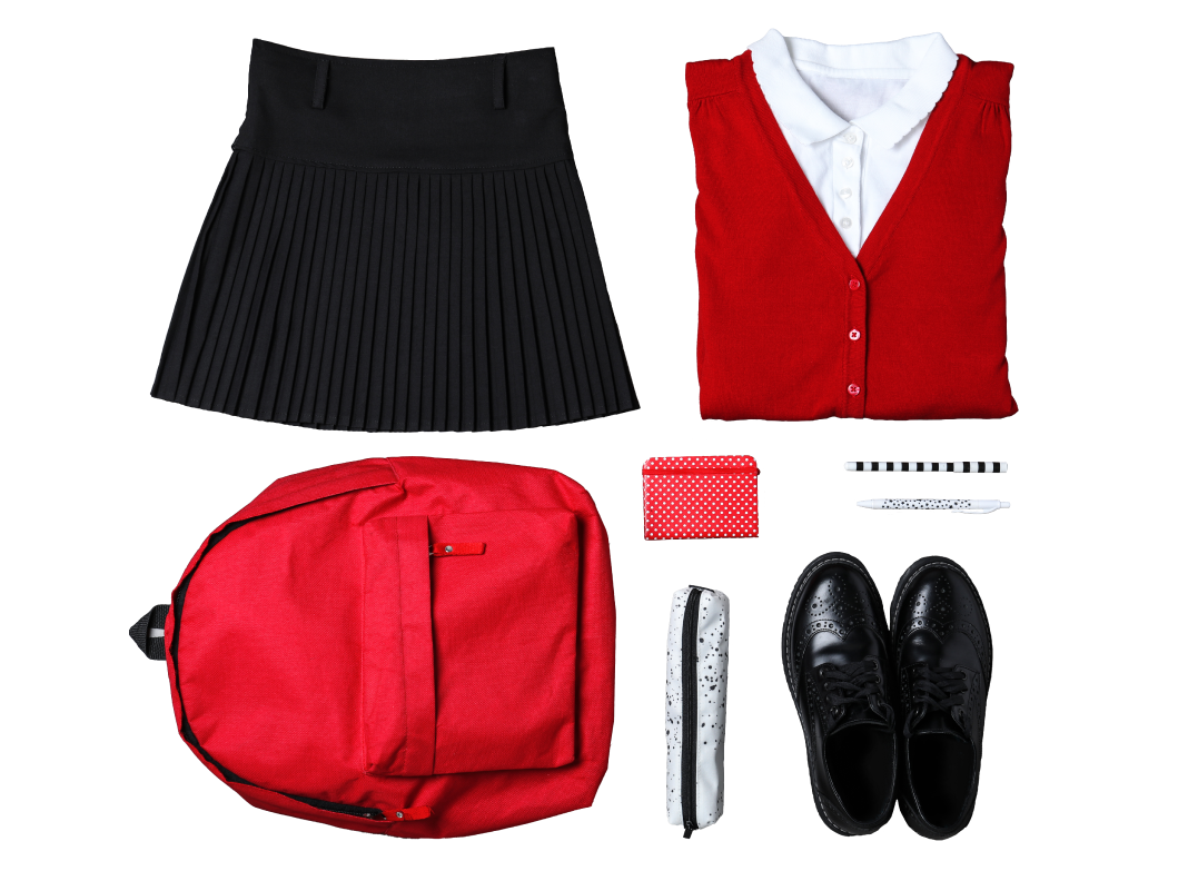Flatlay of school uniform with school supplies