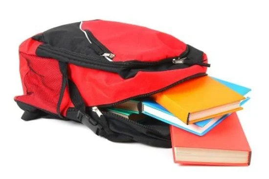 Red backpack filled with books