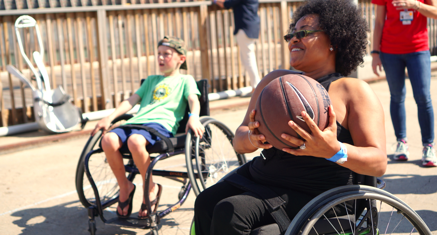 wheelchair athletes playing basketball