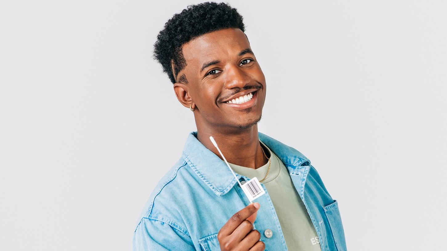 Photo of person with a swab kit