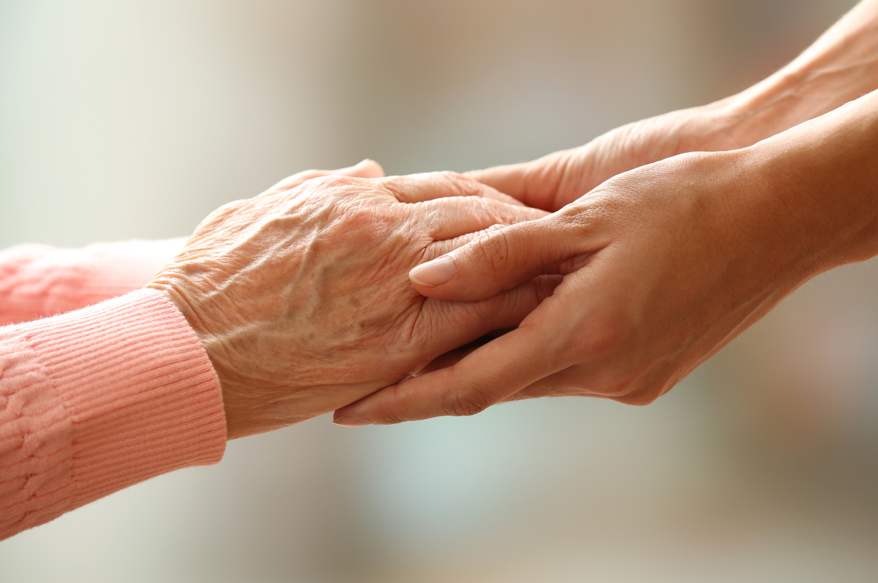 Two people holding hands.