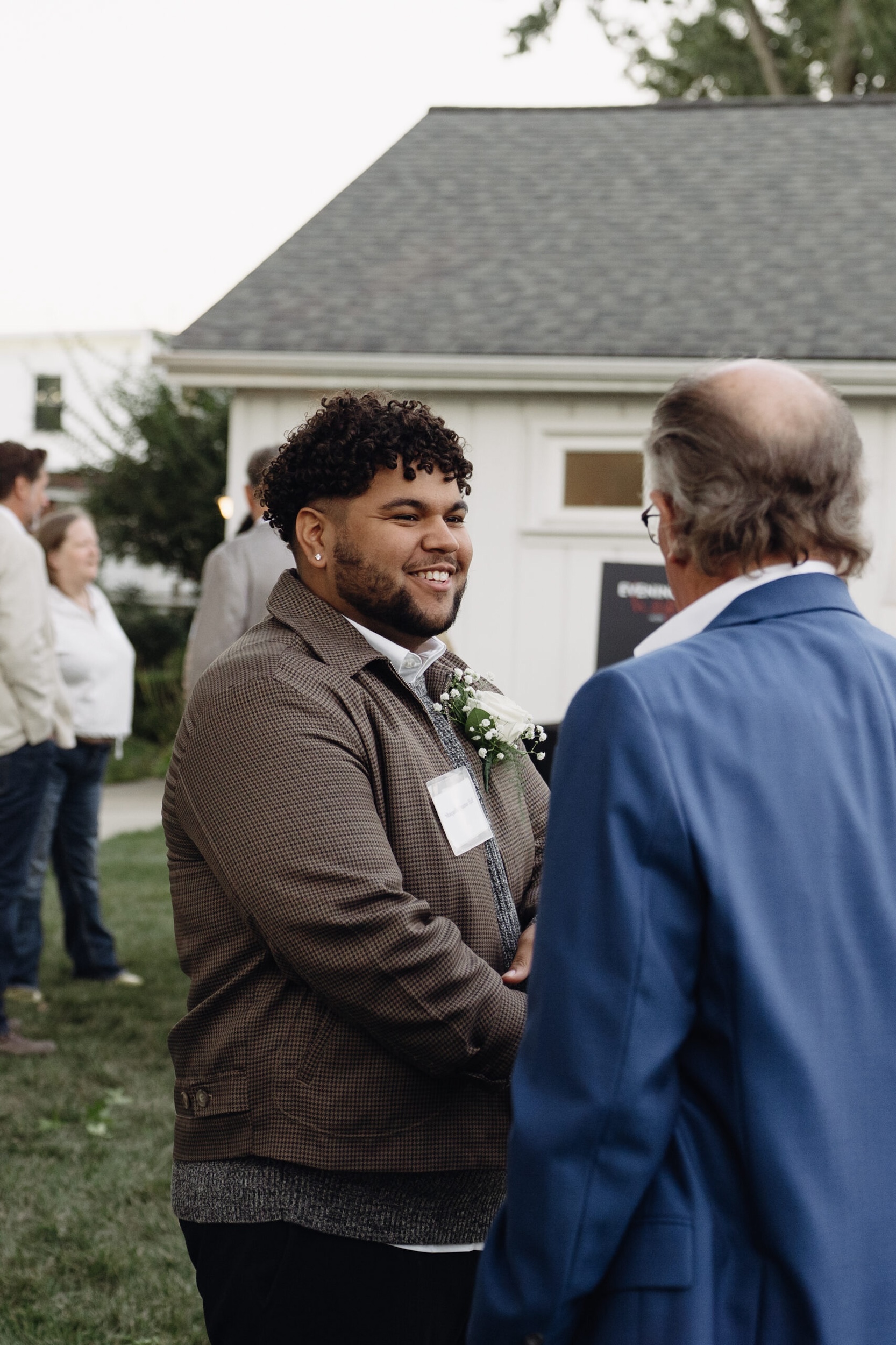 tutor helping young lady scholar with homework after school